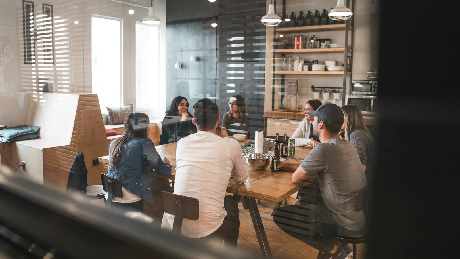 Commercial project team meeting around a table during construction planning